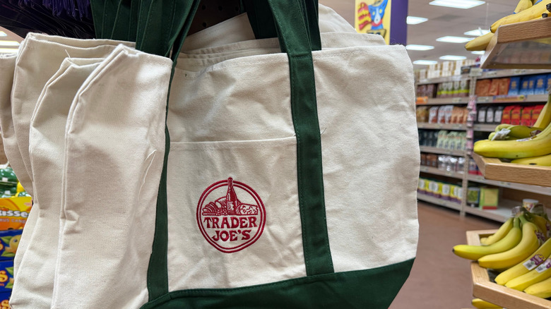 Trader Joe's canvas tote bag hanging in produce section