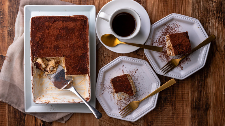 Tiramisu and coffee on dinnerware