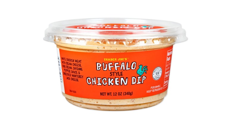 A container of Trader Joe's Buffalo Style Chicken Dip with an orange label, on a white background
