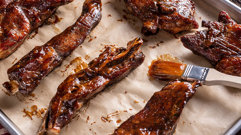 Pork ribs with barbecue sauce on a pan