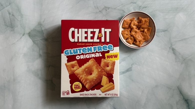 Box of Cheez-It Gluten Free Original Snack Crackers next to bowl of the Cheez-Its
