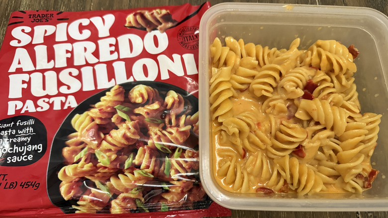 Trader Joe's Spicy Alfredo Fusilloni cooked next to package