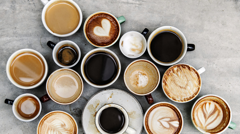 aerial view of multiple different hot coffee beverages