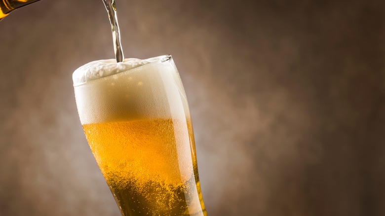 Beer being poured into a glass