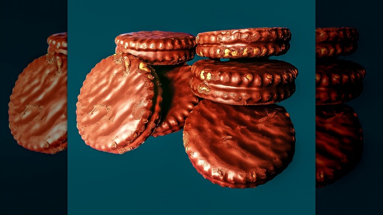 Chocolate covered sandwich crackers on dark blue