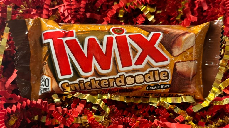 A wrapped Twix Snickerdoodle bar in confetti