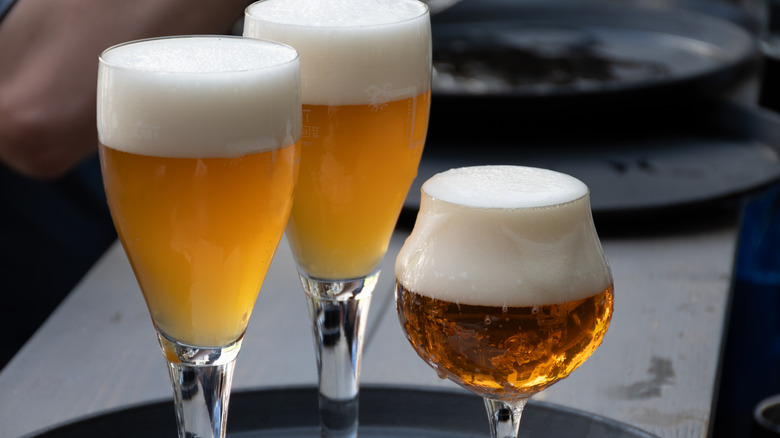 A variety of Belgian beers on a tray