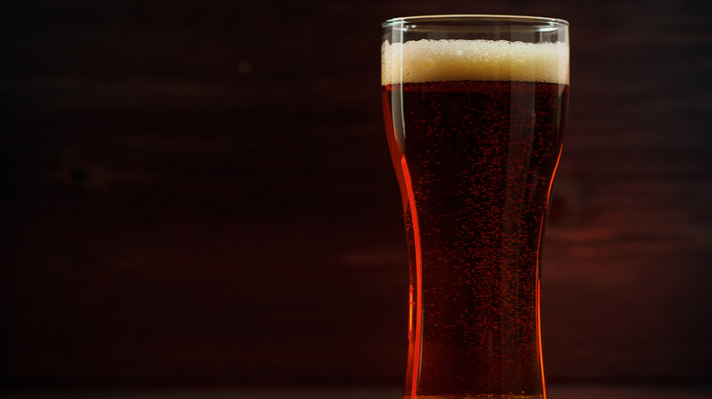 A glass of brown ale
