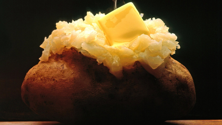 Close up of Baked Potato with melting butter on top