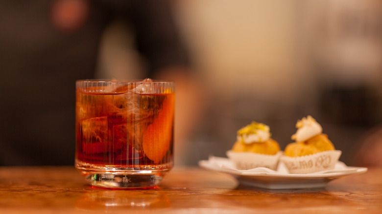 Close up on americano cocktail appetizer on a bartender table