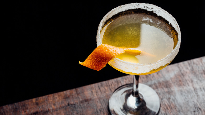 Sidecar Cocktail brandy, triple sec liqueur and fresh lemon juice garnish with orange twist