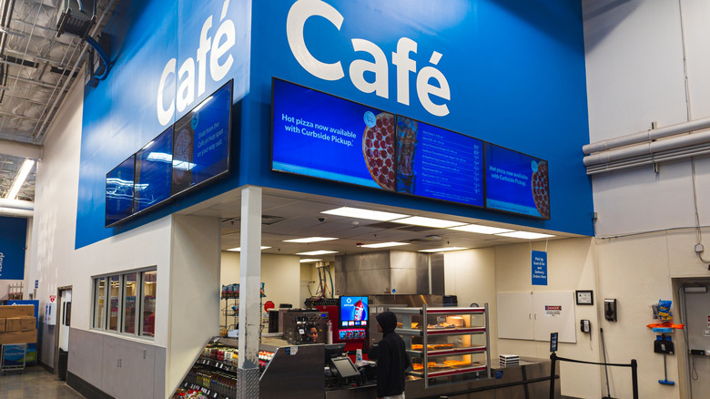 Sam's Club café with a customer in a black hoodie