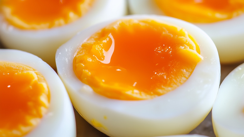 the runny yolk of soft boiled eggs