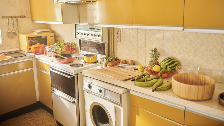 Vintage kitchen with yellow cabinets