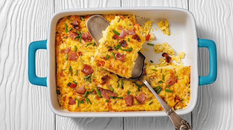 Corn casserole on serving spoon