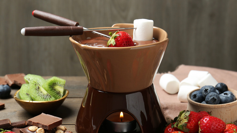 Fondue set with chocolate, fruit, marshmallows