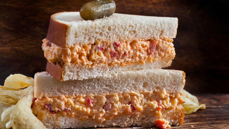 Sliced Pimento Cheese Sandwich on a Wooden Table