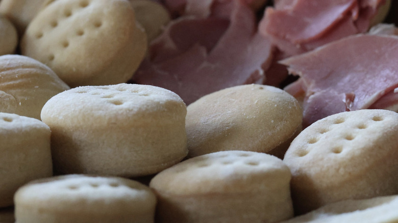 Stack of beaten biscuits with ham