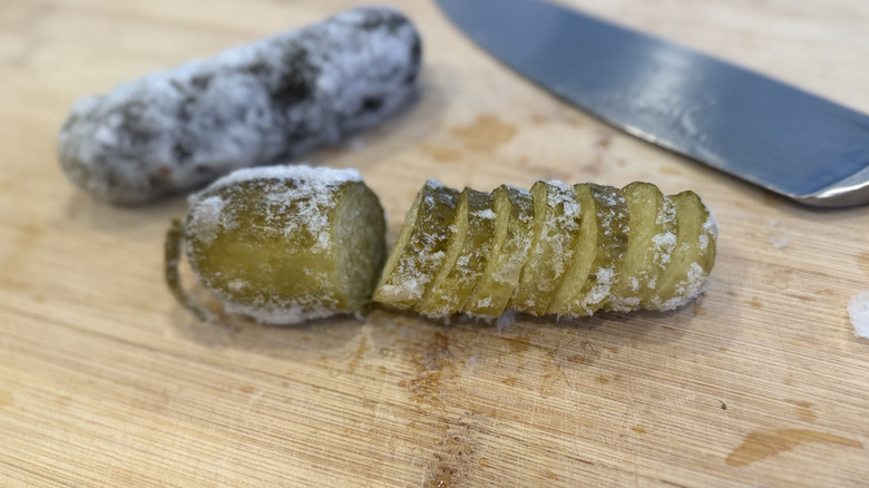 Frozen pickle thats been sliced into pickle chips