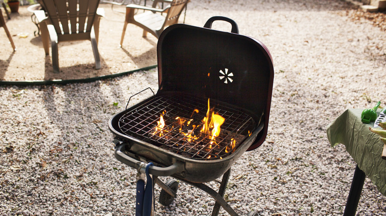 Charcoal grill in backyard