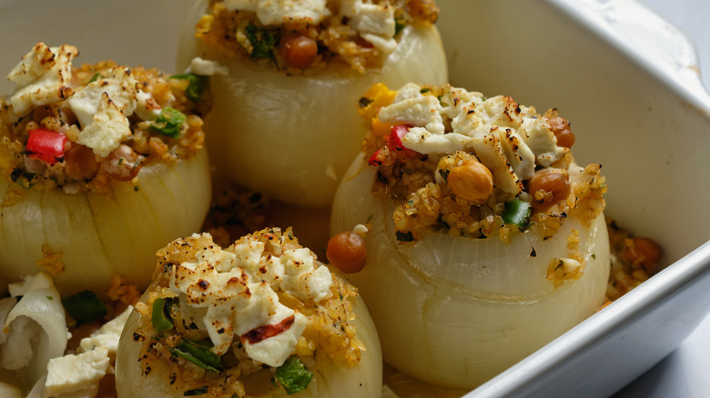Stuffed onions in baking dish