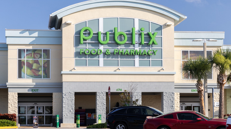 A Publix location with cars parked outside during the day