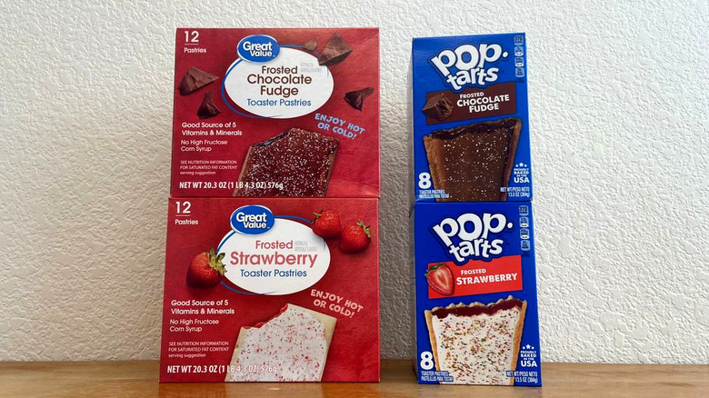 both brands' boxes stacked in towers
