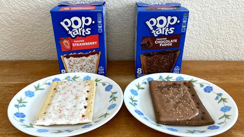 individual Pop-Tarts on small plates in front of their boxes
