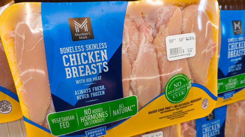 Packages of Member's Mark chicken breasts, in store