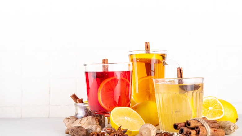Hot Toddy variant drinks on white background