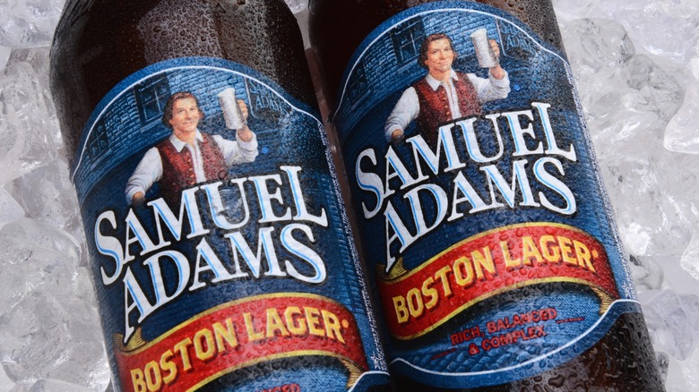Close-up on the labels of two bottles of Sam Adams Boston Lager.