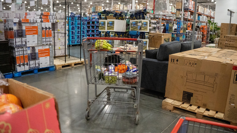 An idle shopping cart inside a Costco