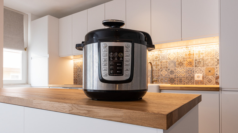 Modern multi cooker in kitchen
