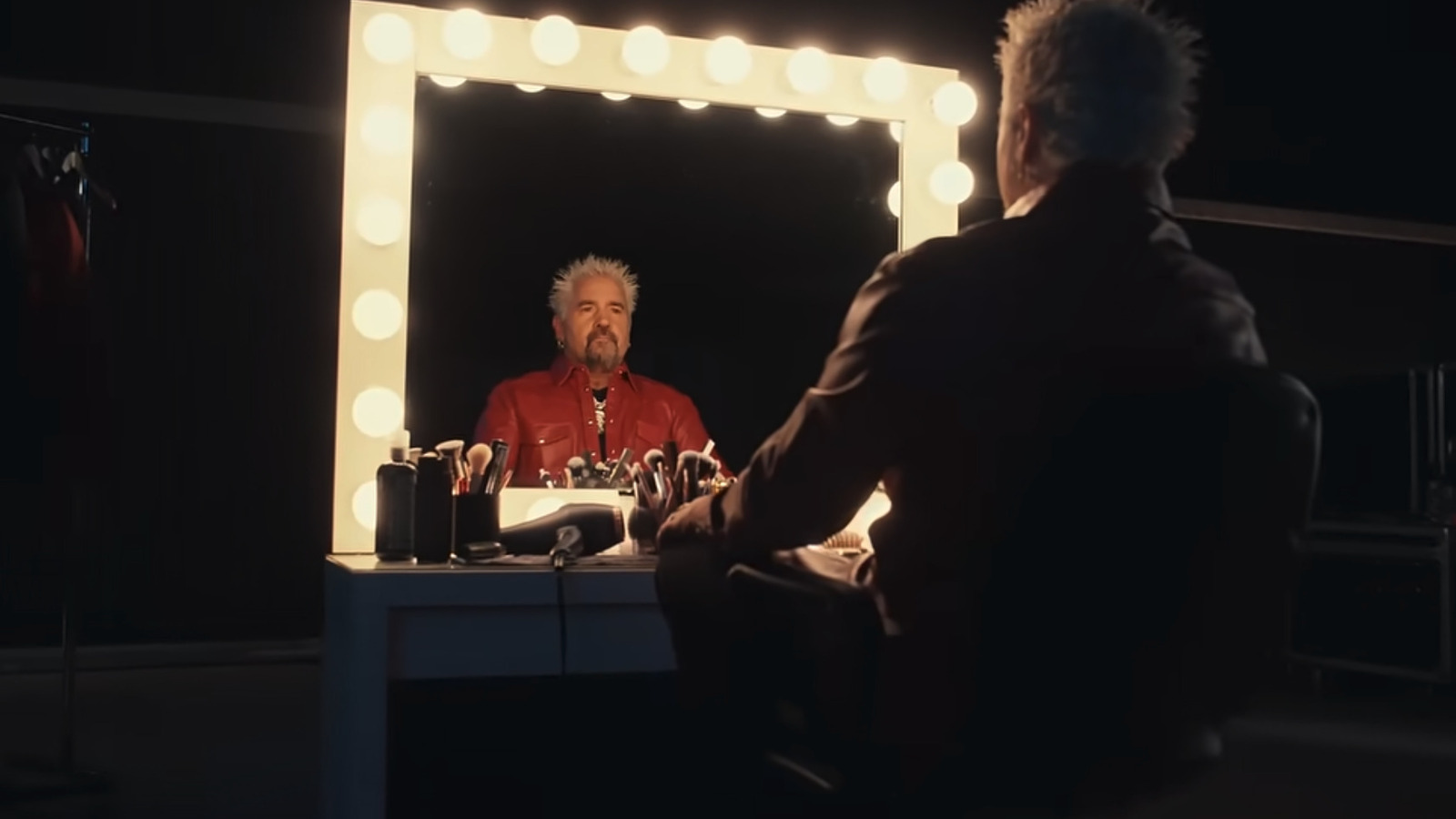 We Finally Know The Origin Of Guy Fieri's Dramatic Makeover — And We're So Relieved - The Takeout image