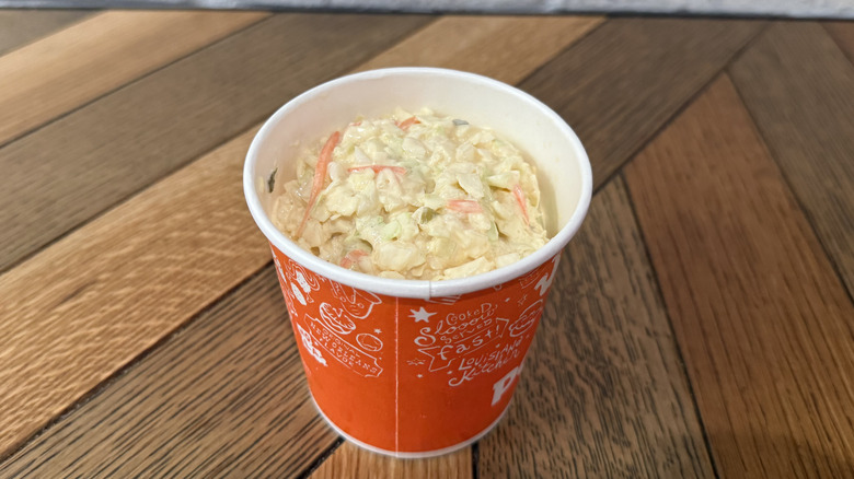 A cup filled with Coleslaw