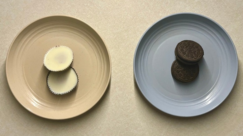 Oreo Reese's Cookie and Reese's Oreo Cup on plates