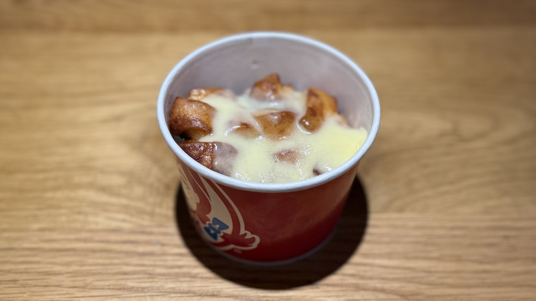 A cup of Cinnabon Pull-Apart on a table
