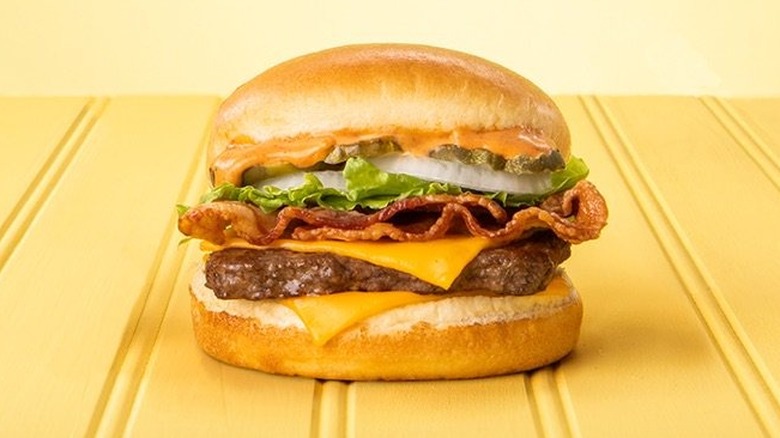 a wendy's burger on a table