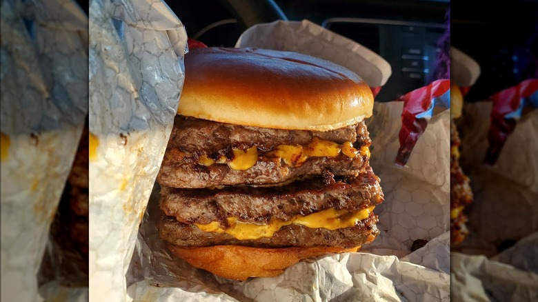A Wendy's burger with four beef patties