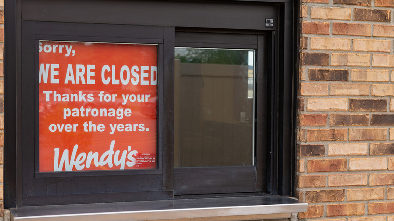 Wendy's drive thru with permanent closure sign