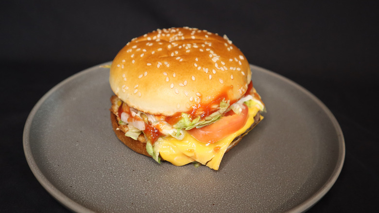 Quarter Pounder with Cheese Deluxe on plate