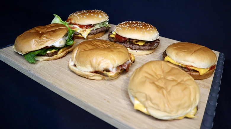 Wendy's burgers compared in front of McDonald's burgers