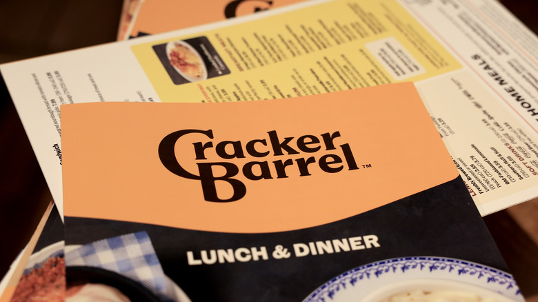 The Cracker Barrel Lunch & Dinner menu on top of other menus at the restaurant chain