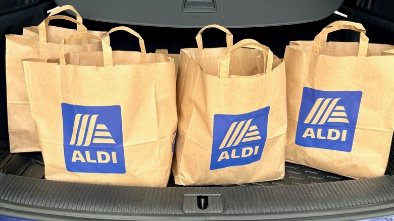 brown paper shopping bags with Aldi logos