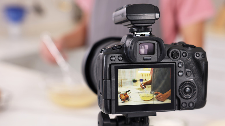 A camera filming someone cooking