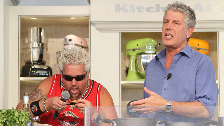 Guy Fieri and Anthony Bourdain at cooking demonstration