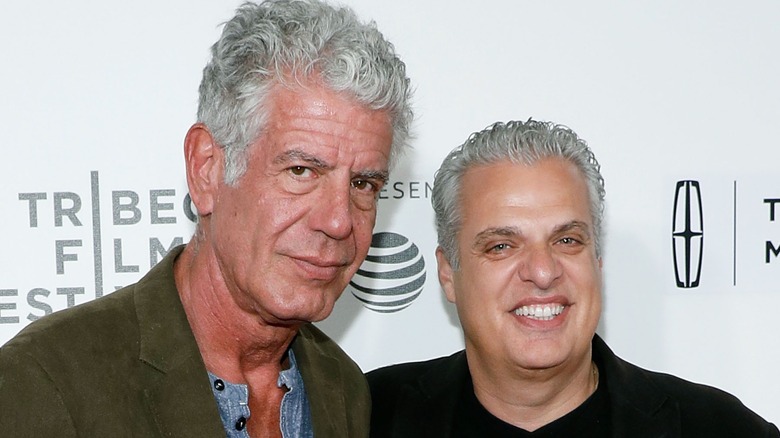 Anthony Bourdain standing with Eric Ripert