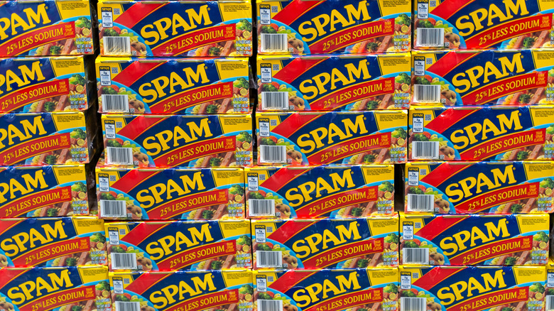 Boxes of Spam less sodium stacked on top of each other