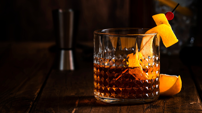 Sazerac cocktail with lemon twist