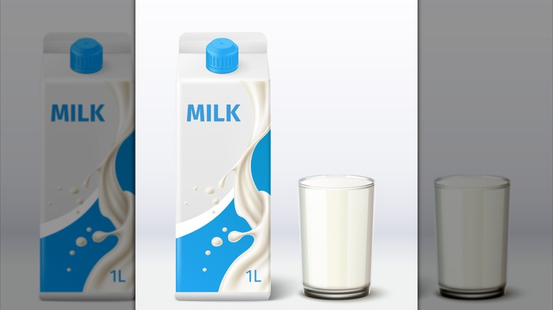 Milk carton and glass of milk next to each other